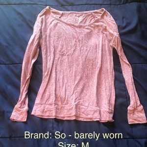 Long sleeve heathered pink top.